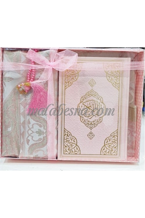 Box containing Holy Quraan Rosary and praying carpet