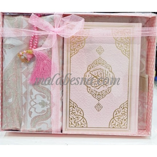 Box containing Holy Quraan Rosary and praying carpet