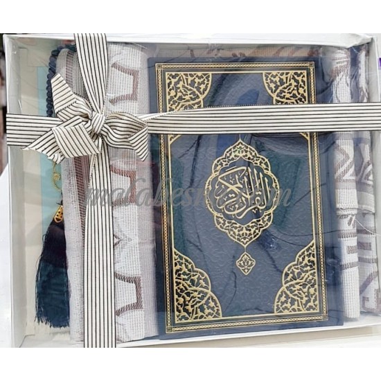 Box containing Holy Quraan Rosary and praying carpet