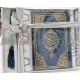 Box containing Holy Quraan Rosary and praying carpet