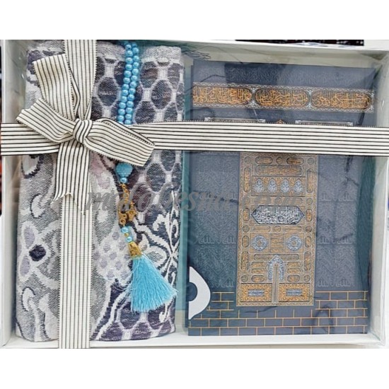 Box containing Holy Quraan Rosary and praying carpet