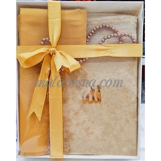 Box containing Hijab Surat Yaseen Rosary and a carpet