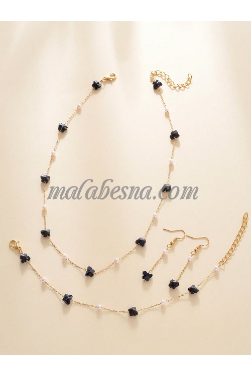 3 Pieces golden set of necklace earrings and bracelet with black butterfly and white pearls