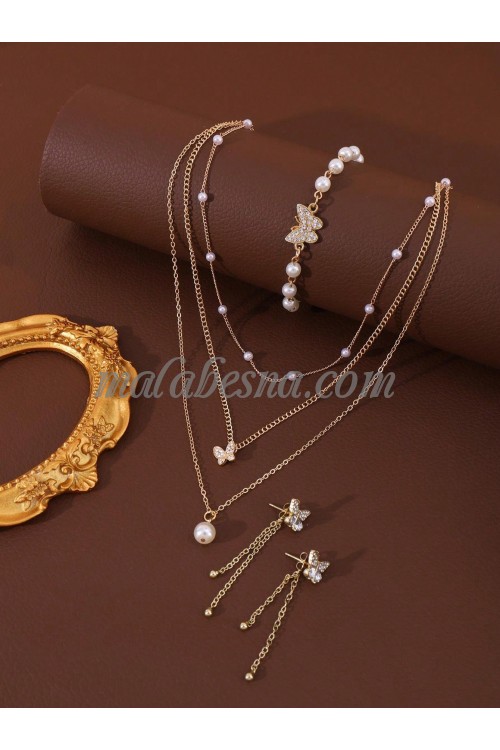 3 Pieces golden set of necklace earrings and bracelet with butterfly and white pearls