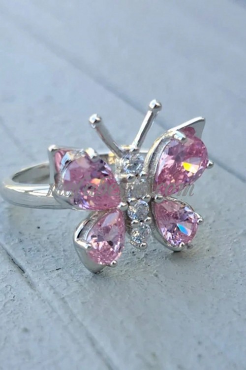 Silver ring with butterfly and pink on its wings