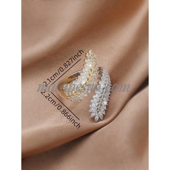 Open Golden color ring with white and yellow shiny stones Open Golden color ring with white and yellow shiny stones