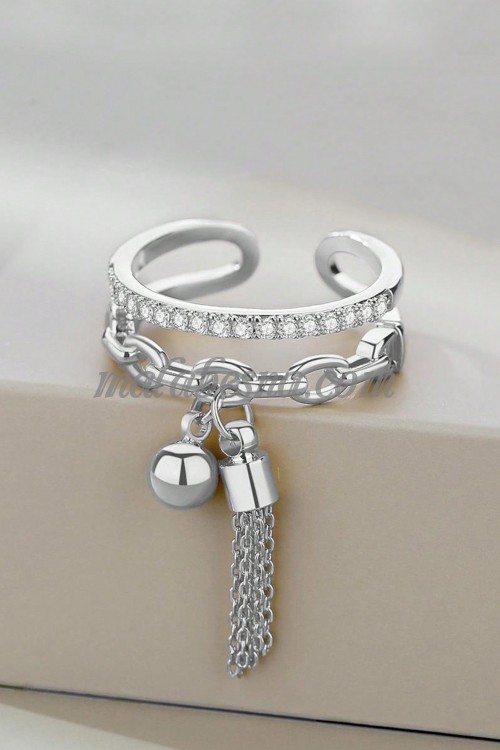 Silver open ring with bell