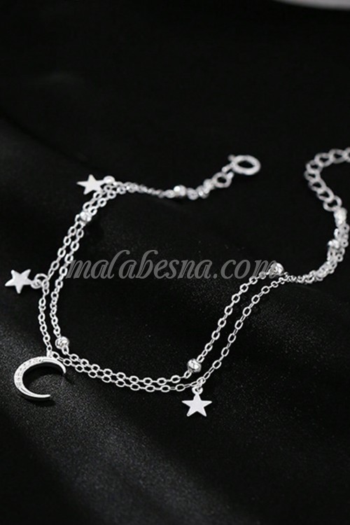 Silver bracelet with moon and stars