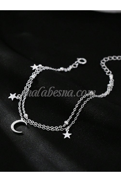 Silver bracelet with moon and stars