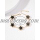 Golden bracelet with black flower and diamonds