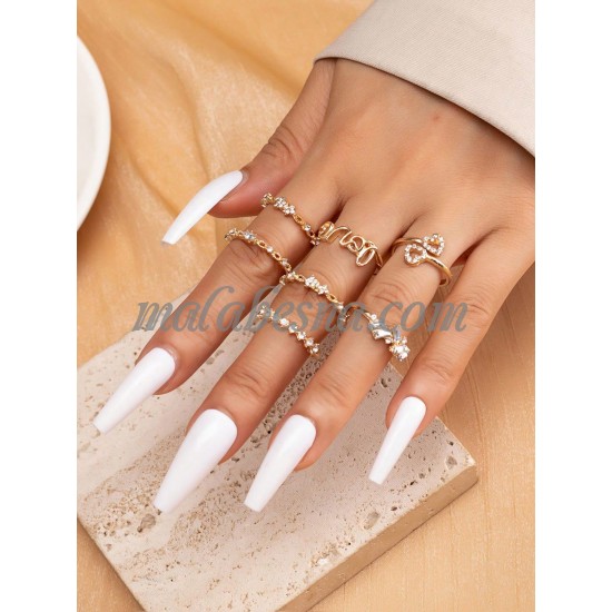 7 golden rings set with various patterns 7 golden rings set with various patterns