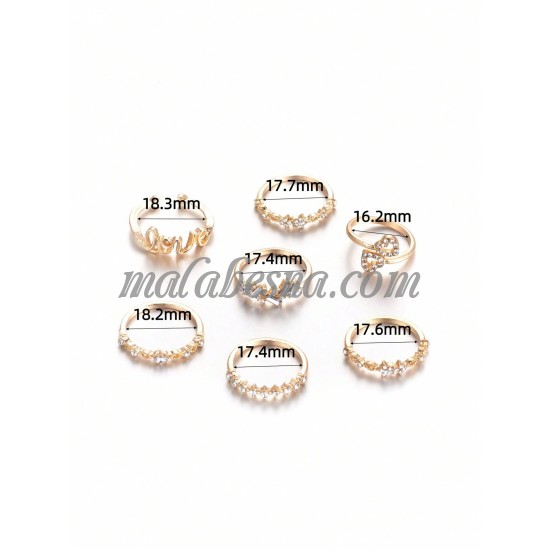 7 golden rings set with various patterns 7 golden rings set with various patterns
