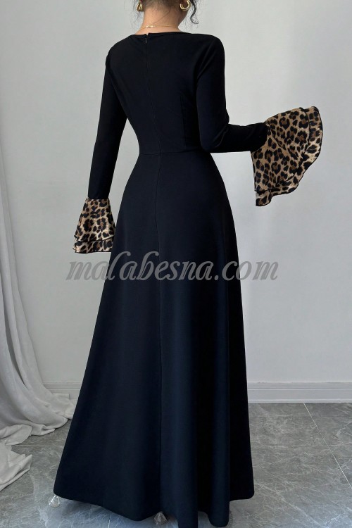 Black dress with tiger pattern below and on the sleeves