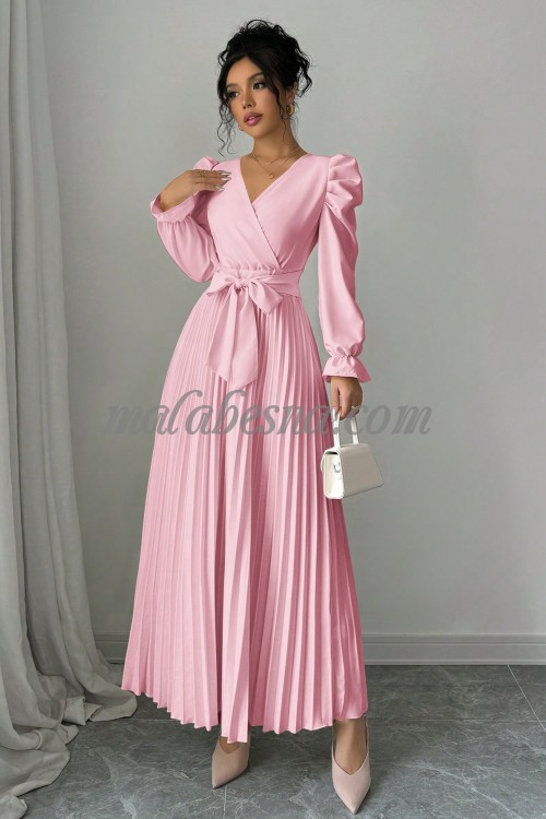 Pink wavy dress with bow tie in the middle