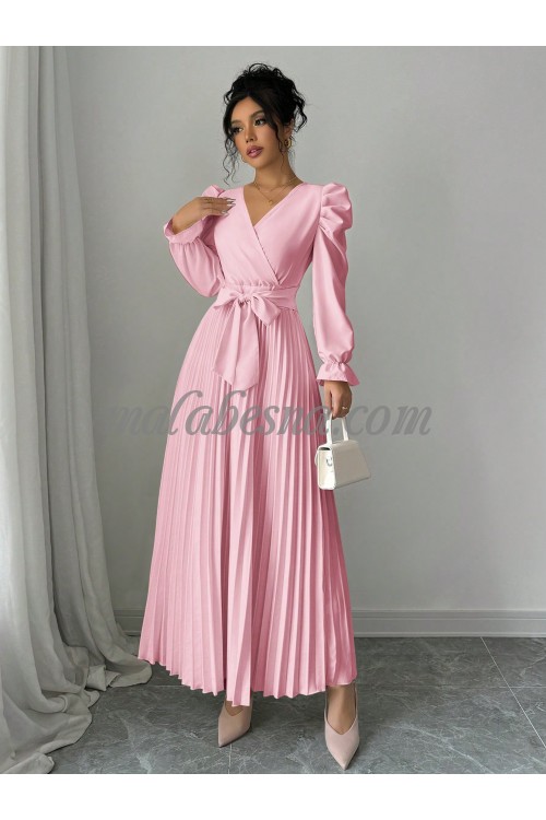 Pink wavy dress with bow tie in the middle