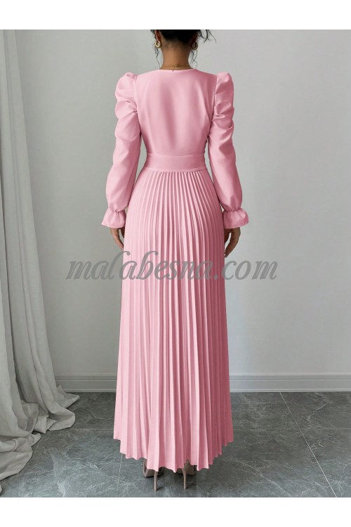 Pink wavy dress with bow tie in the middle