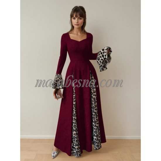 Burgundy dress with tiger pattern below and on the sleeves Burgundy dress with tiger pattern below and on the sleeves