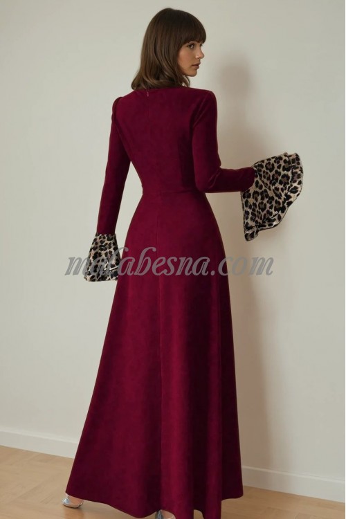 Burgundy dress with tiger pattern below and on the sleeves