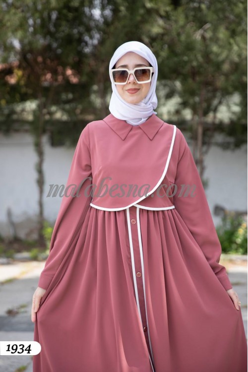 pink dress with white lines and buttons from infront with pockets