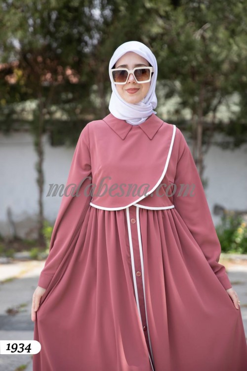 pink dress with white lines and buttons from infront with pockets