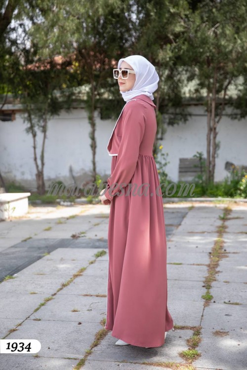 pink dress with white lines and buttons from infront with pockets