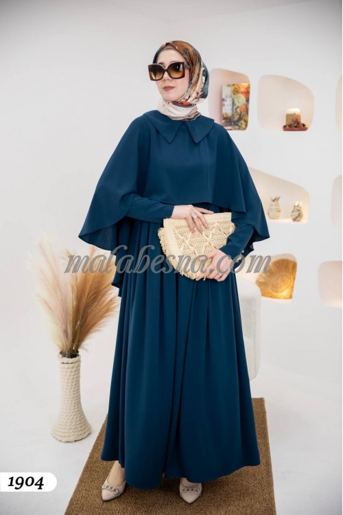 petrol dress with layer on the chest and from back