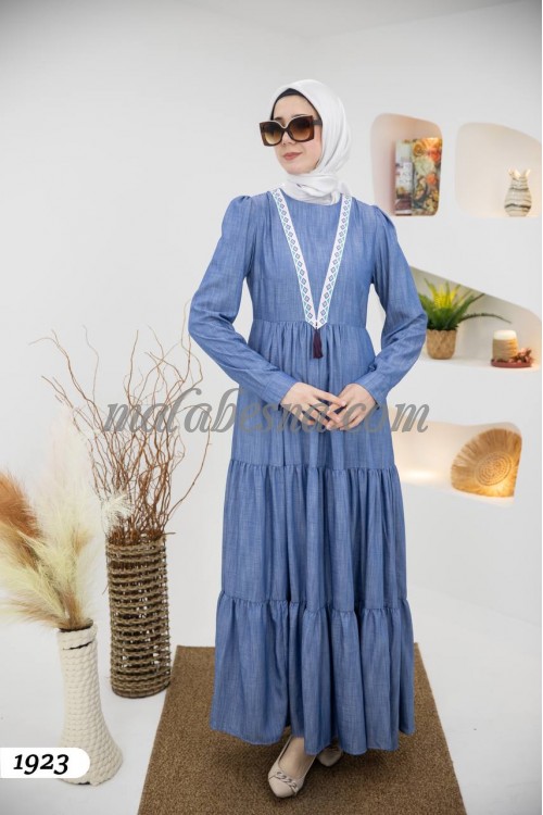 Blue jeans dress with layers and Cloche dress with pattern on V on the chest