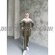 2 Pieces oily green tracksuit with white on top and lines on the shoulders 2 Pieces oily green tracksuit with white on top and lines on the shoulders
