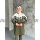 2 Pieces oily green tracksuit with white on top and lines on the shoulders 2 Pieces oily green tracksuit with white on top and lines on the shoulders
