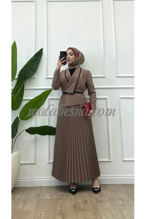 Beige pleated dress with black shiny stones on the chest