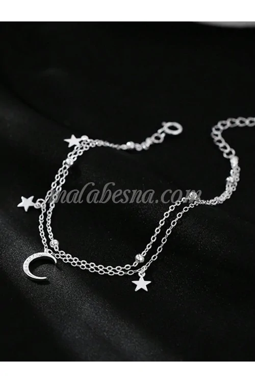 Silver bracelet with moon and stars