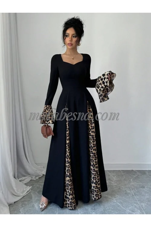 Black dress with tiger pattern below and on the sleeves