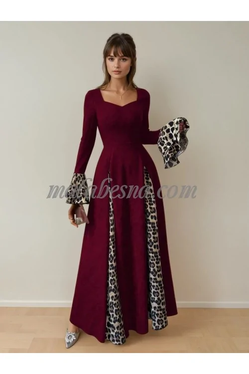 Burgundy dress with tiger pattern below and on the sleeves