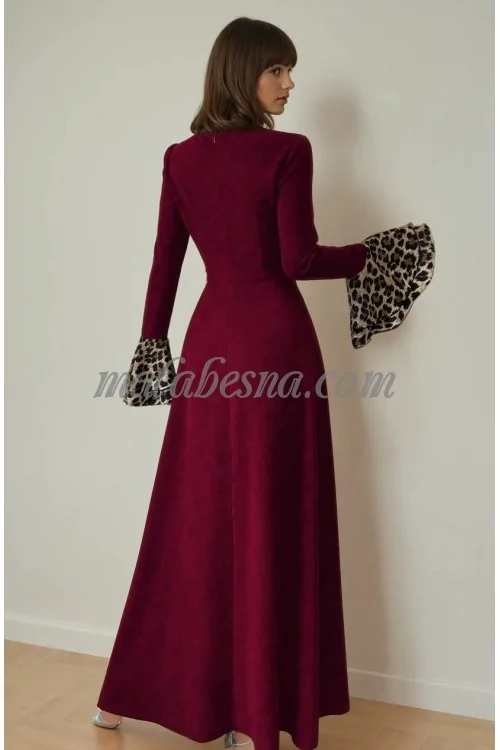Burgundy dress with tiger pattern below and on the sleeves